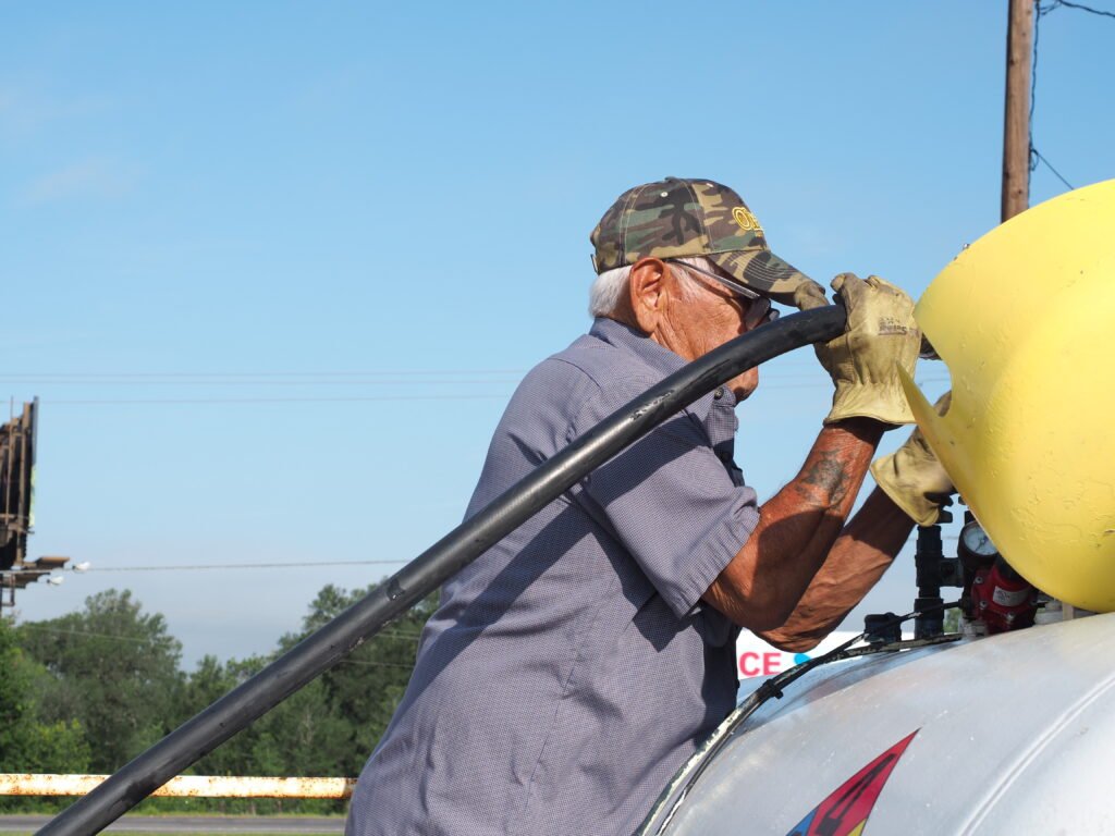 Oscar filling up a tank at the Luling location.